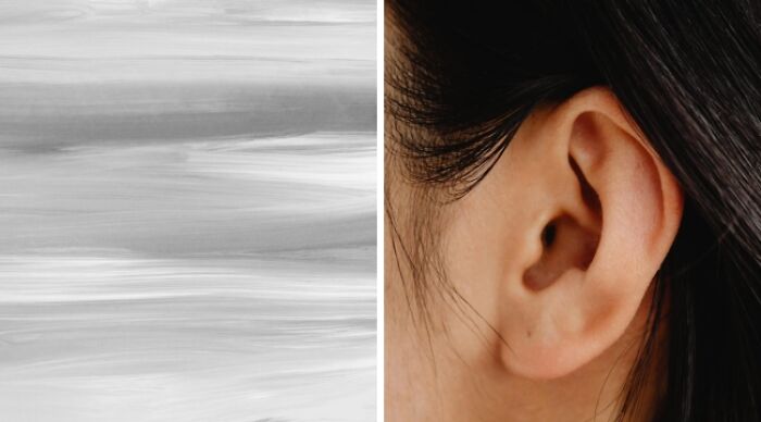 Close-up of an ear next to abstract grayscale texture, symbolizing dilemmas and choices.