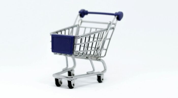 A small shopping cart against a white background for 'would you rather' dilemmas discussion.