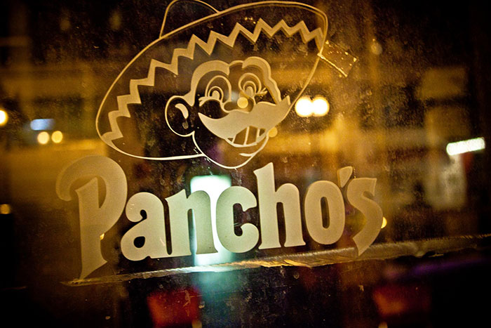 Pancho's logo on a glass door, representing a remembered restaurant that doesn't exist today.