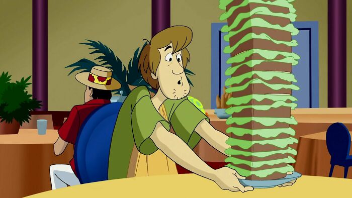 Cartoon character holding a tall sandwich, wide-eyed in shock; example of actors perfect for specific roles.