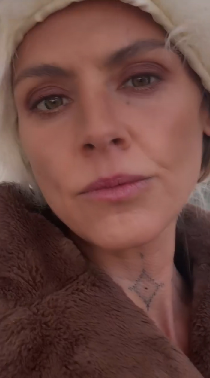 A person in a fur coat responds to trolls about Ozempic concerns at a premiere event.