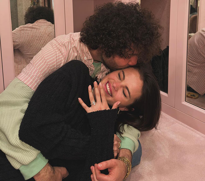 Selena Gomez's fianc&eacute; embraces her warmly, showcasing a loving interaction.