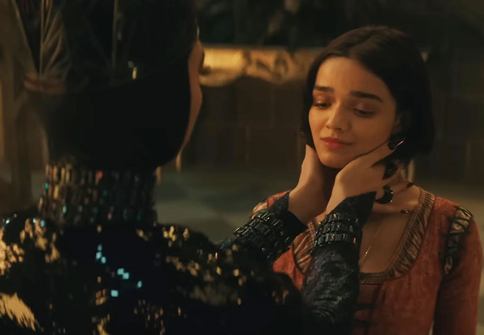 Scene from 'Snow White' showing two characters in a dramatic moment.