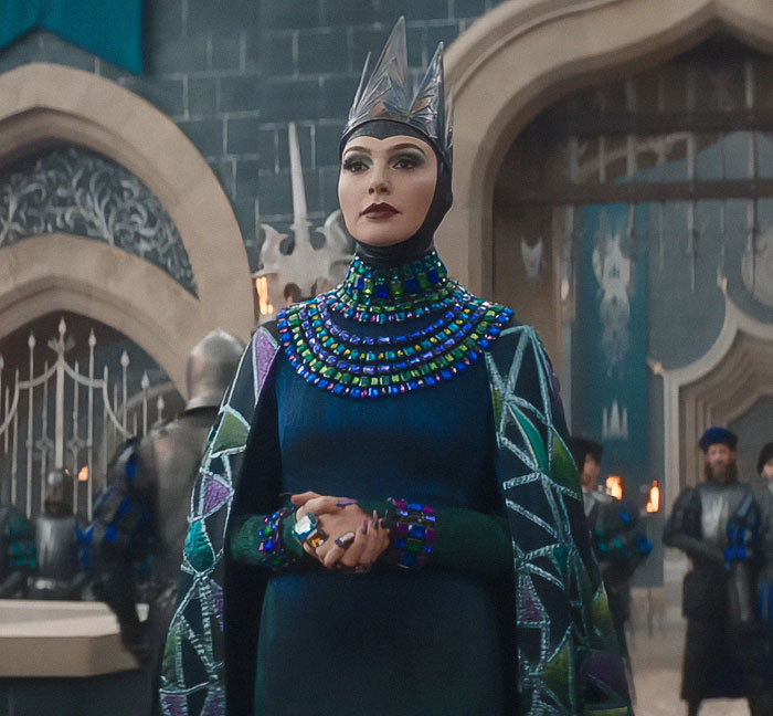 Regal character in a beaded costume from Disney's Snow White, related to its flop and poor IMDb ranking. Regal character in a beaded costume from Disney's Snow White, related to its flop and poor IMDb ranking.