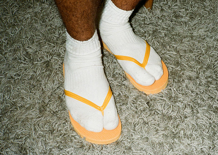 Socks with flip-flops at the gym, an example of bizarre attire spotted by people.