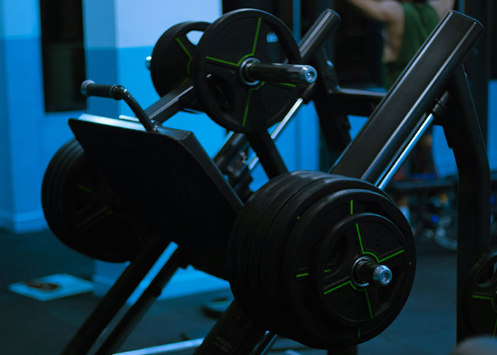 Weights stacked on a gym leg press machine, a place for bizarre gym activity sightings.