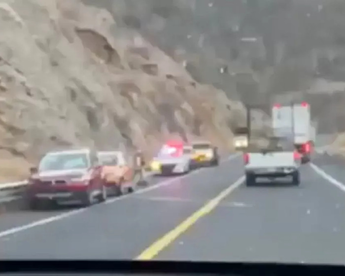 Vehicles on a highway. Vehicles on a highway.