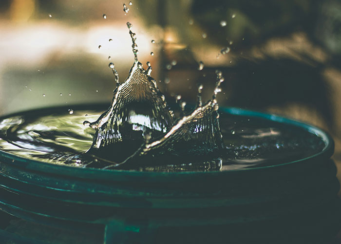 Water splash in a still setting, capturing chaos and unpredictability, symbolizing wild reasons for legal action.