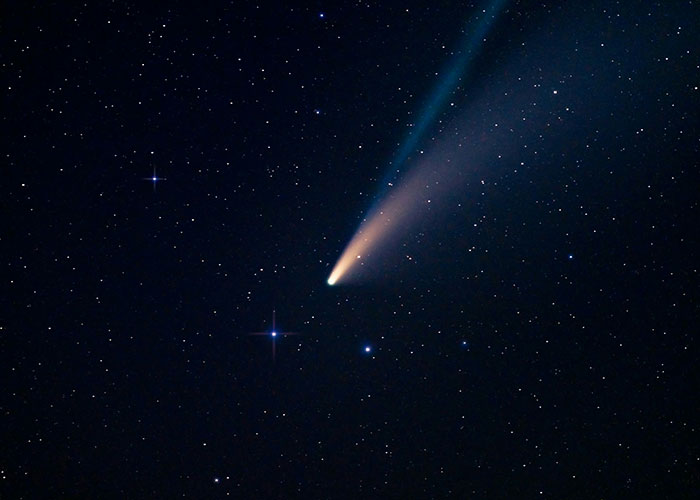 Bright comet streaking across a starry night sky, illustrating wild reasons for a lawsuit.