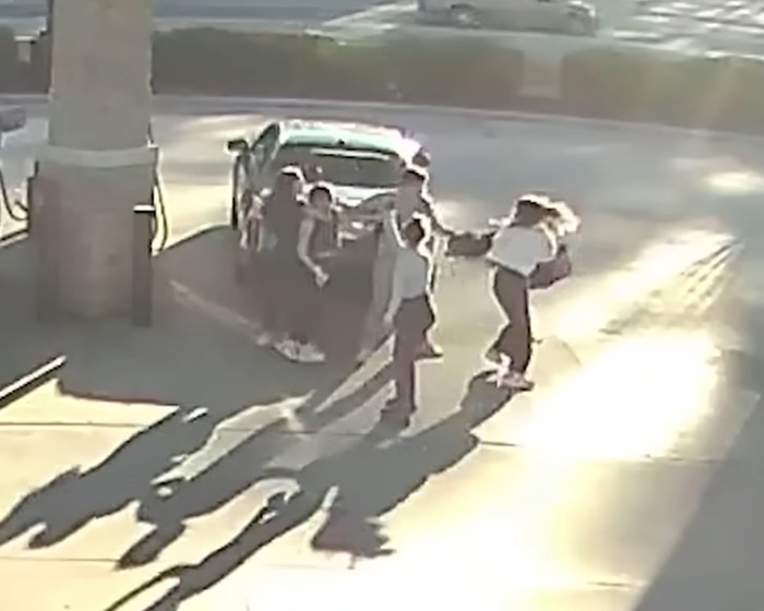 Gas station brawl as girl body slams suspect, captured in viral video during prom dress heist.