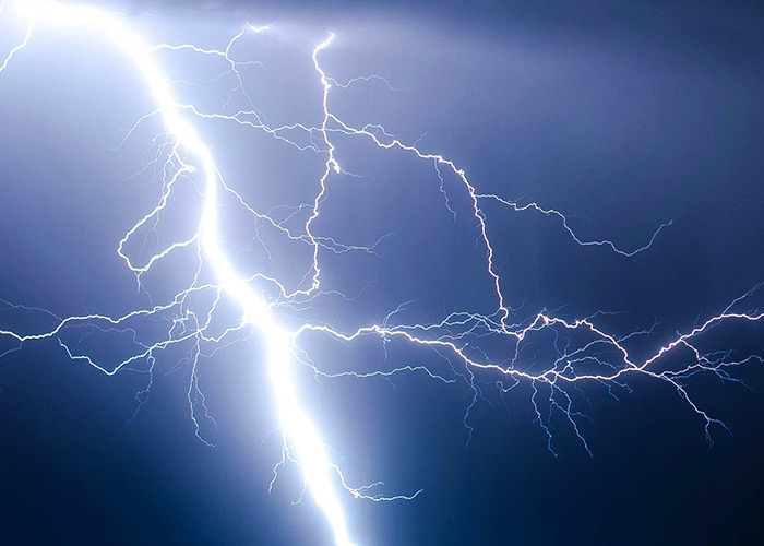 Lightning bolts against a dark sky, illustrating unusual and unsettling facts shared by an influencer.