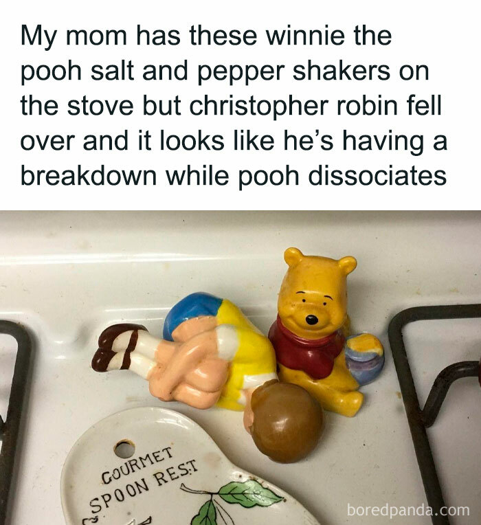 Winnie the Pooh salt and pepper shakers: Pooh sits while Christopher Robin figurine is tipped over humorously on the stove.