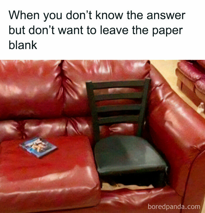 Red sofa with a black chair replacing a cushion, illustrating a random meme joke about filling blanks.
