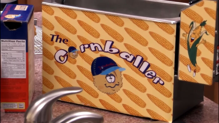 Vintage Cornballer appliance with playful design on kitchen counter, symbolizing nostalgic discontinued products.