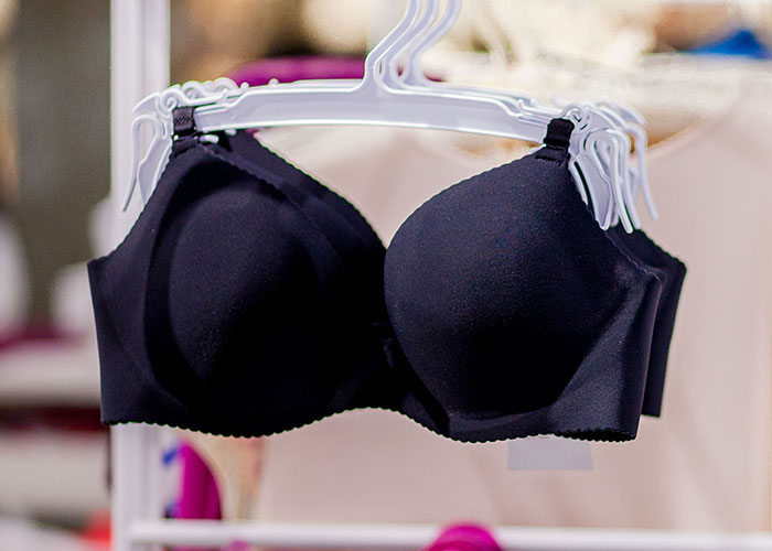 Black bra on a hanger in a store, representing a wild audition story.