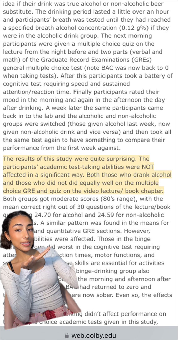 College student in front of study results discussing alcohol's impact on test performance.