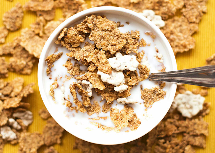 Bowl of cereal with milk, illustrating a questionable diet choice.