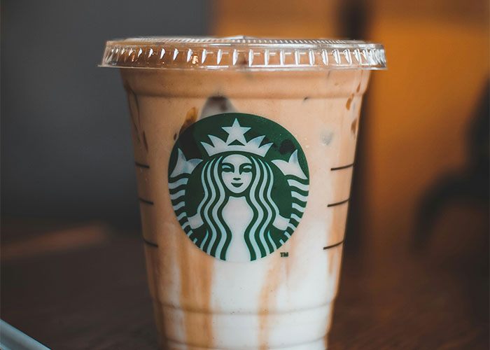 Starbucks iced coffee, symbolizing an unusual diet choice, with a focus on worst diet experiences.