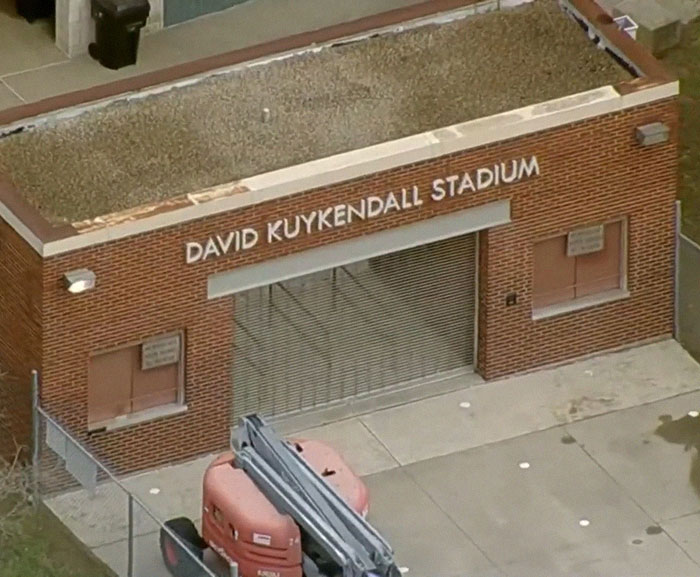 David Kuykendall Stadium entrance, with a red lift nearby.