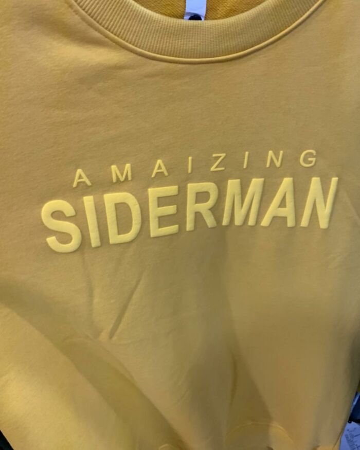 Yellow shirt with "Amaizing Siderman" printed, illustrating a humorous translation error.