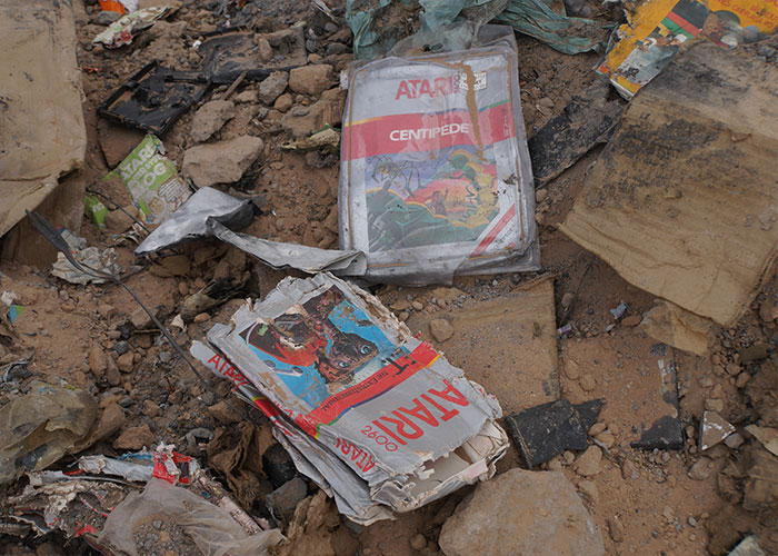 Buried Atari games, including "Centipede," uncovered in a desert landfill, proving wild rumors true.