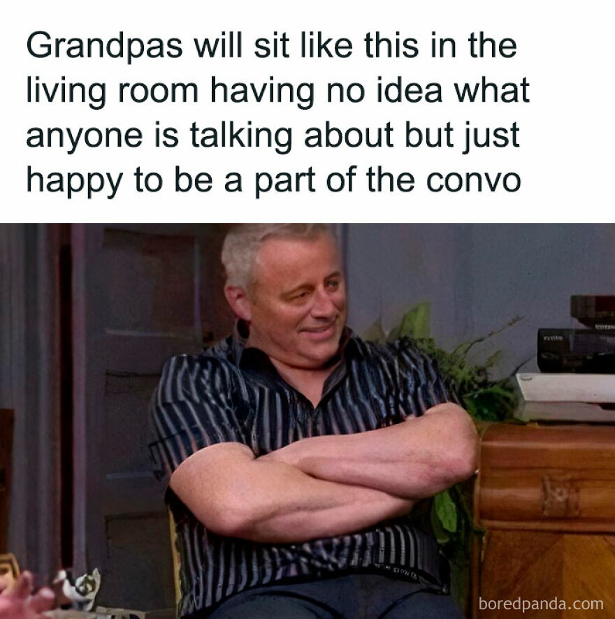 Man sitting with arms crossed, smiling in confusion, capturing the joy and madness of parenthood conversations.