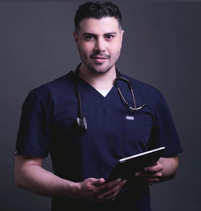 Man posing as surgeon with stethoscope and tablet, linked to BBL implant story.