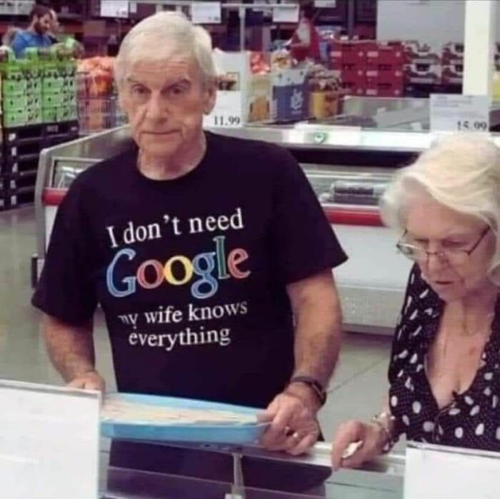 Older man wearing a funny meme shirt in a store, helping to insulate from all the noise in the world around you.