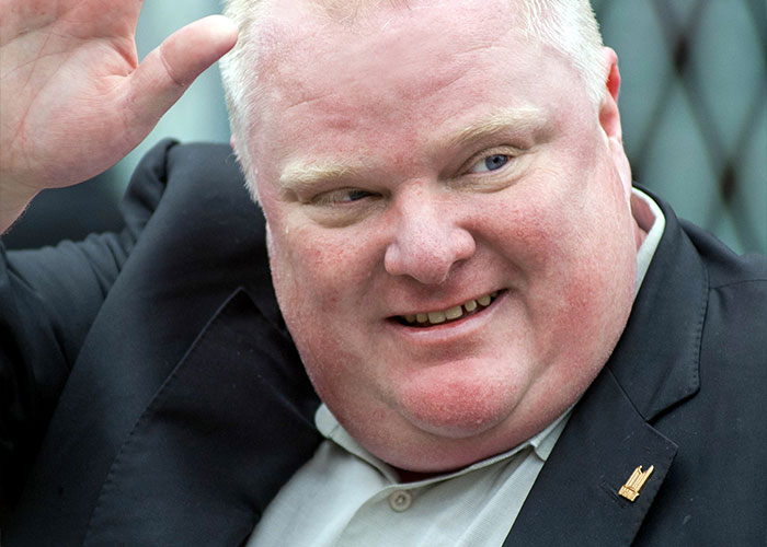 Man smiling and waving, related to wild rumors proven true.