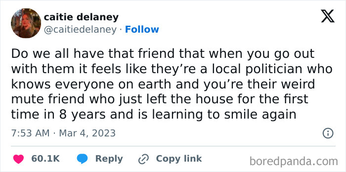 Funny tweet about feeling awkward with a sociable friend, posted by caitie delaney on March 4, 2023.
