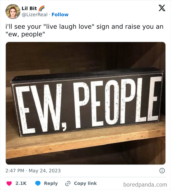Sign with "Ew, People" text on a shelf, reflecting anti-social sentiment in a humorous meme format.