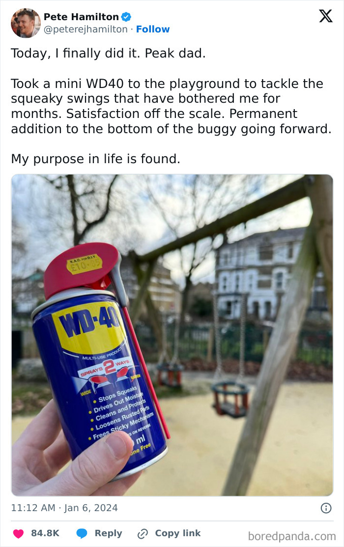 Hand holding WD-40 can at a playground with swings in background representing uplifting moments in daily scroll.