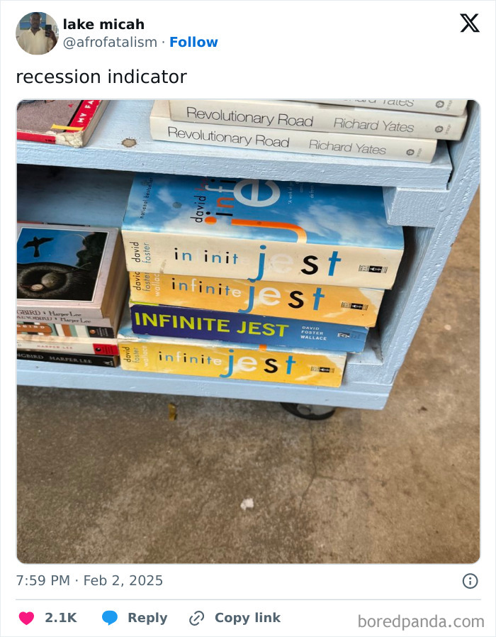 Stack of "Infinite Jest" books on a shelf, shared as a humorous recession indicator.