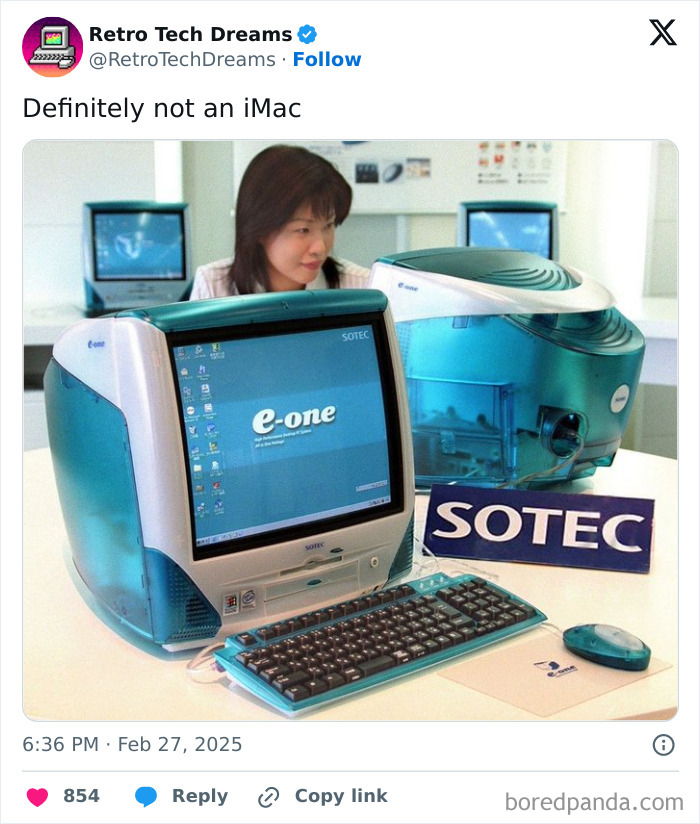 Retro tech enthusiast looking at a vintage Sotec e-one computer setup, featuring a teal monitor and keyboard.