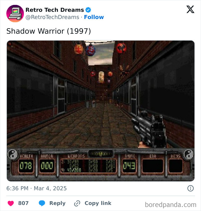Retro tech scene from "Shadow Warrior" game, 1997, showing a first-person view in a digital alleyway.