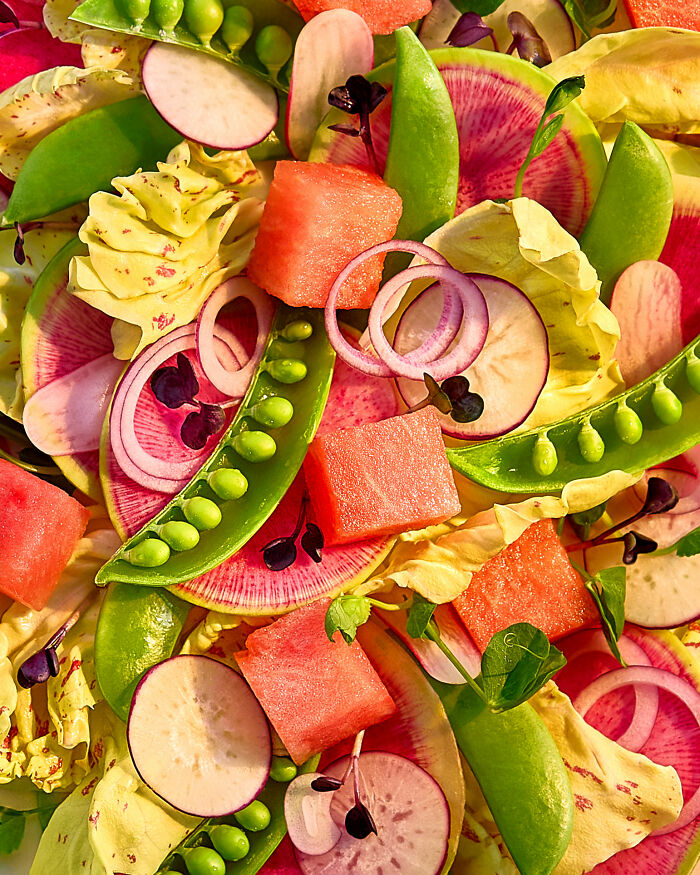 A vibrant salad with veggies and watermelon showcased for the 2025 World Food Photography Awards shortlist.