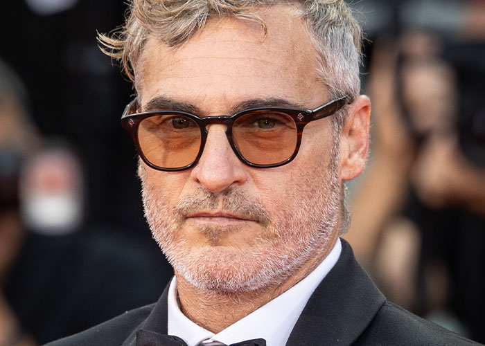 Man in glasses and suit, representing wild rumors confirmed true.