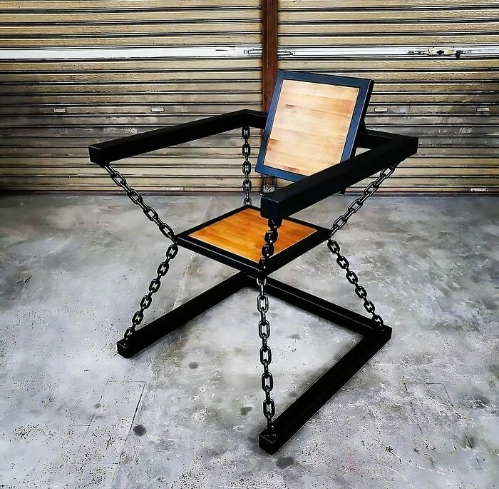 Modern industrial chair with wood seat and backrest, featuring metal frame and chain supports, showcasing unique woodworking ideas.