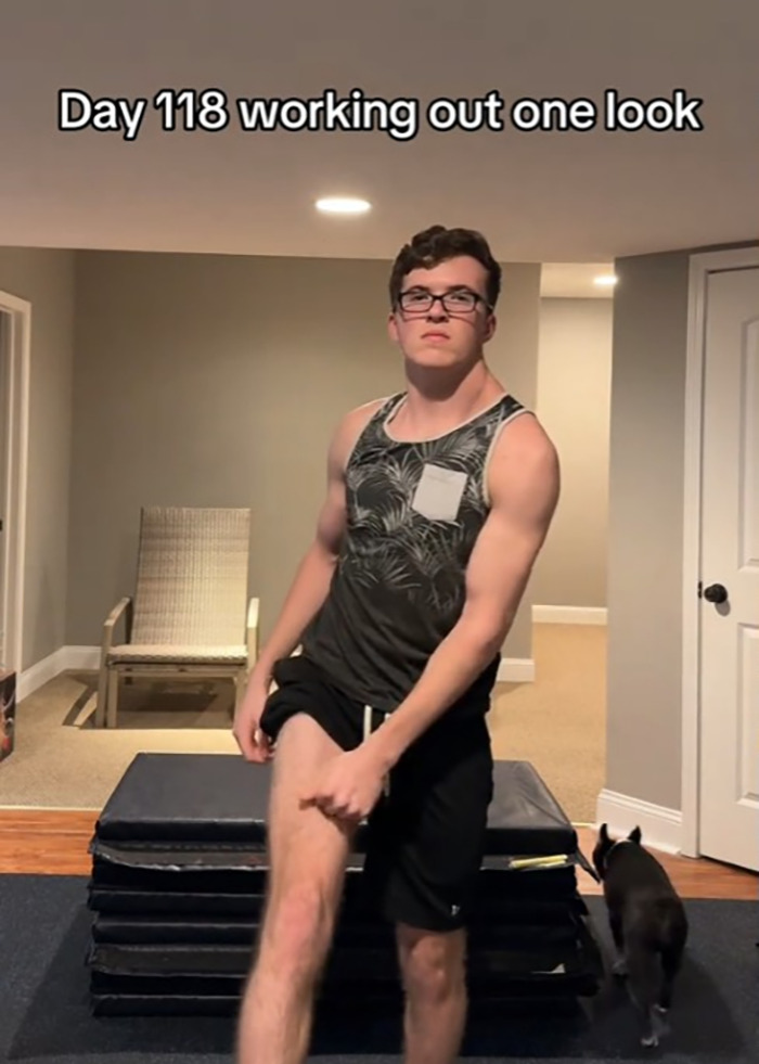 19-year-old focusing on one-sided workout, showing arm and leg progress in casual setting.
