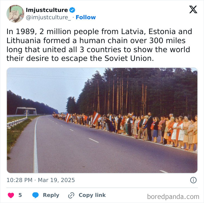 Baltic Way human chain in 1989 with people lining a road, connecting Latvia, Estonia, and Lithuania in a historic protest.