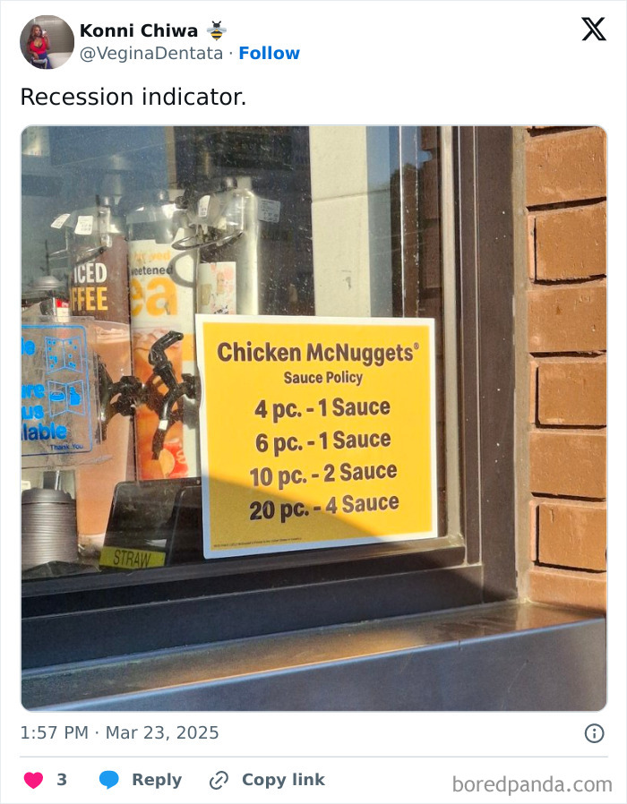 McNuggets sauce sign as a recession indicator displayed in a store window.