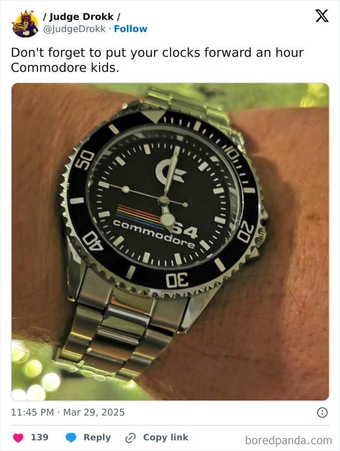 Wrist wearing a retro Commodore watch with hour change reminder on screen.