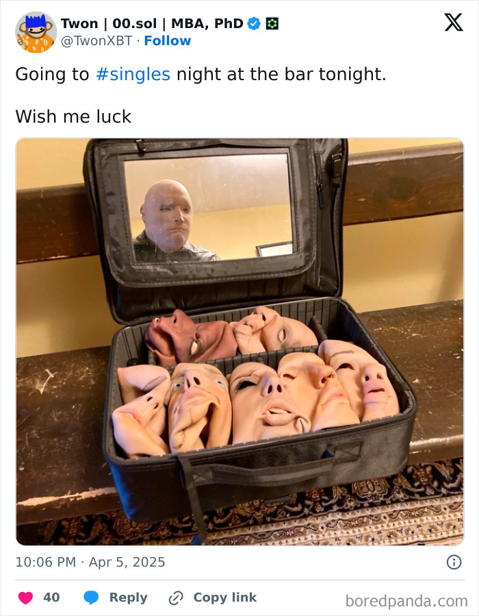 Suitcase of masks with reflection in mirror, capturing a humorous moment for tweets of the month.