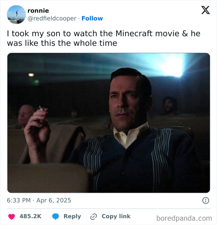 Man sitting in a theater looking serious, holding a cigarette, captioned with a funny tweet about a Minecraft movie.