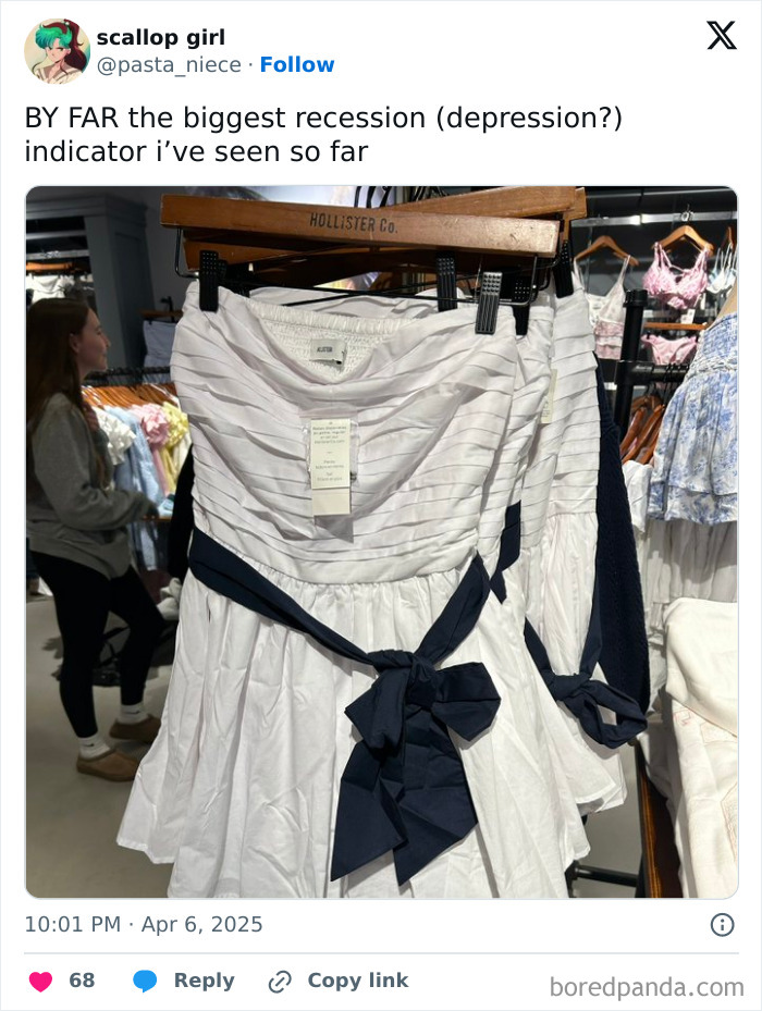 A white dress at Hollister with a dark blue ribbon, shared as a humorous recession indicator.