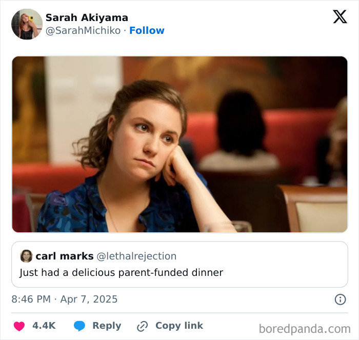 Woman looking thoughtful in a restaurant, featured in the funniest tweets of April.