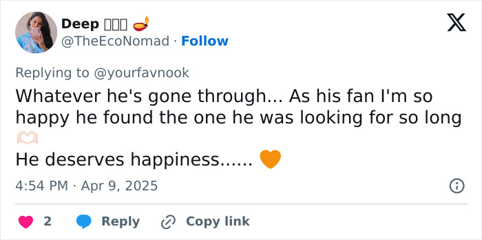 Tweet expressing happiness for Keanu Reeves and his girlfriend, highlighting he deserves happiness.