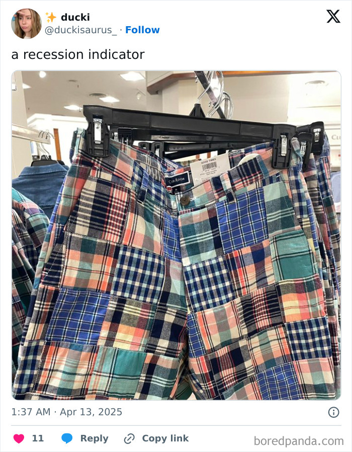 Plaid patchwork shorts in a store, humorously labeled as a recession indicator.
