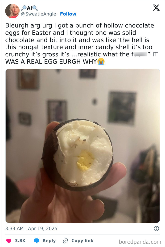 Funniest tweet of the month: A person reveals a chocolate egg filled with a real egg, expressing surprise and disbelief.