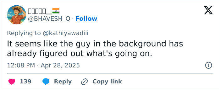 Screenshot of a tweet describing a man in the background appearing aware during a horrifying viral video involving a mass tragedy.